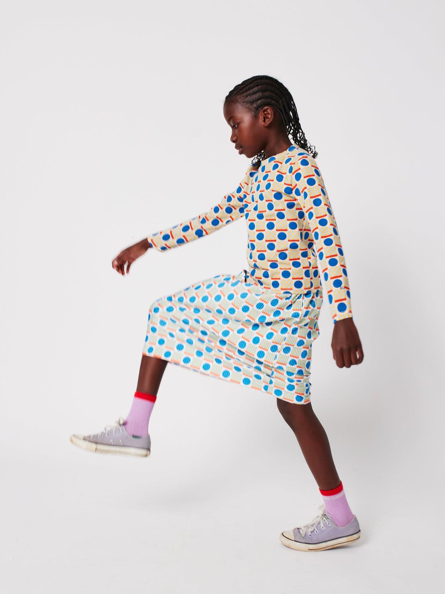 Geometric Scacs over pencil pleated skirt