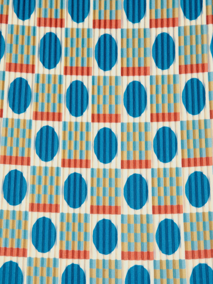 Geometric Scacs over pencil pleated skirt