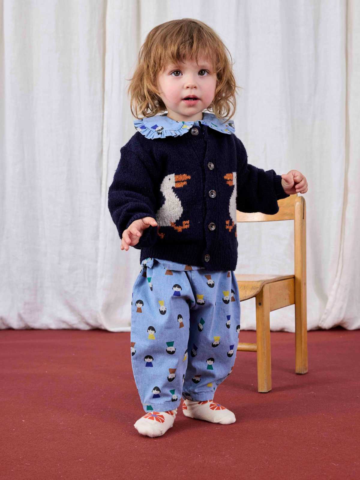 Game Pawns all over light denim blouse