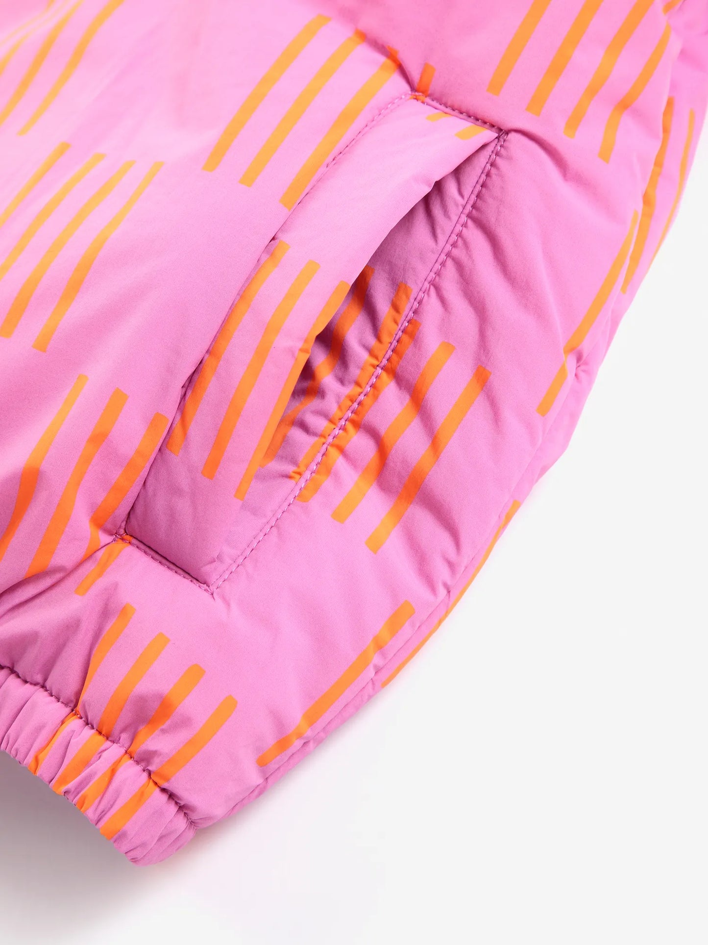 Almost Moiré all over reversible pink anorak