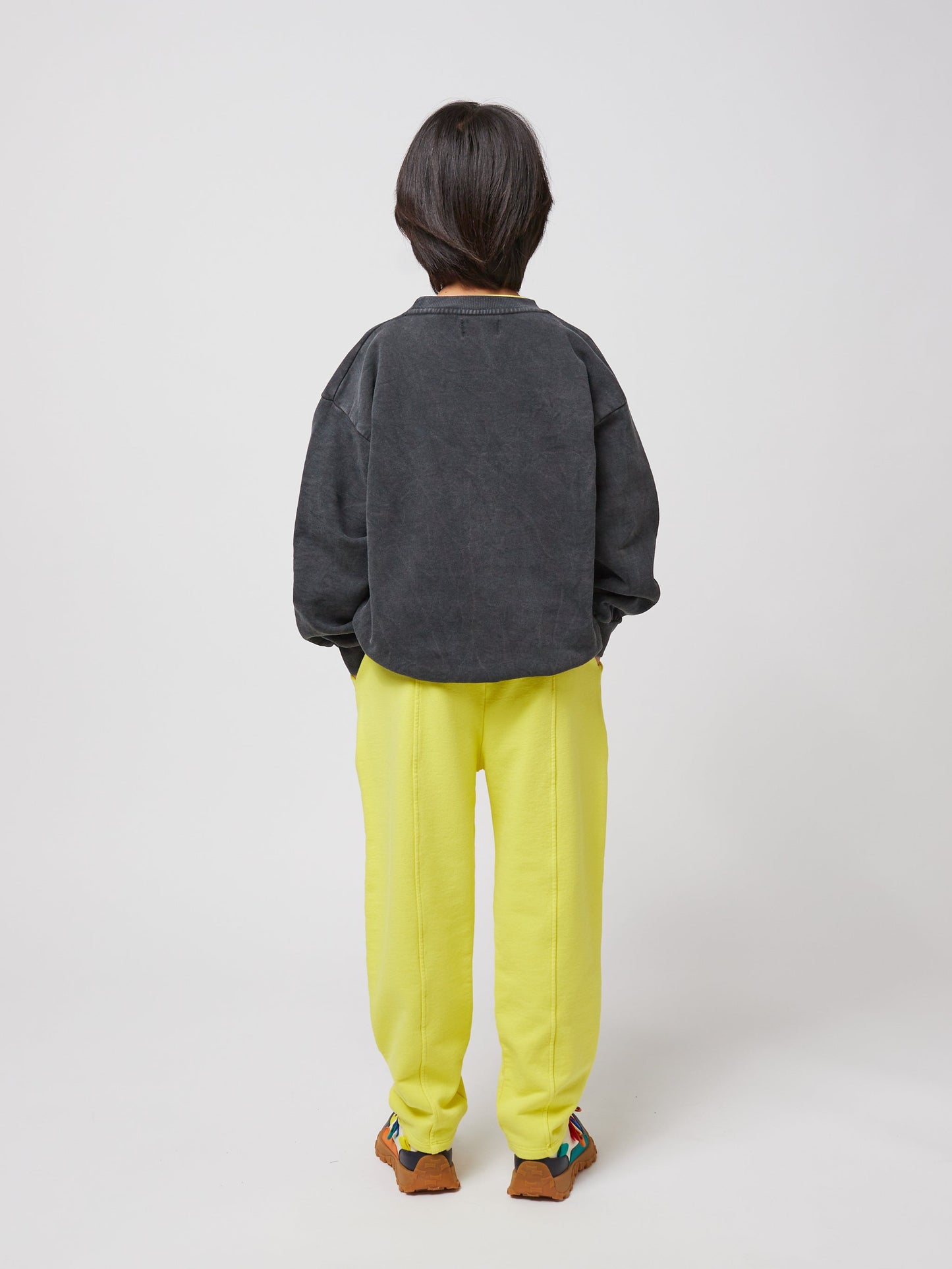 Smiling yellow jogging pants