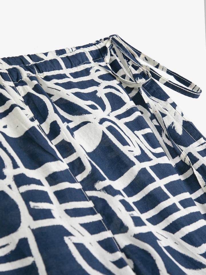 Cookery festival pattern wide-leg trousers