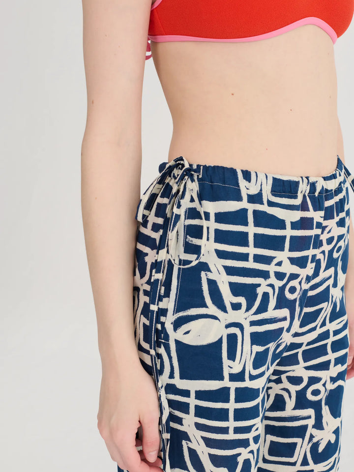 Cookery festival pattern wide-leg trousers