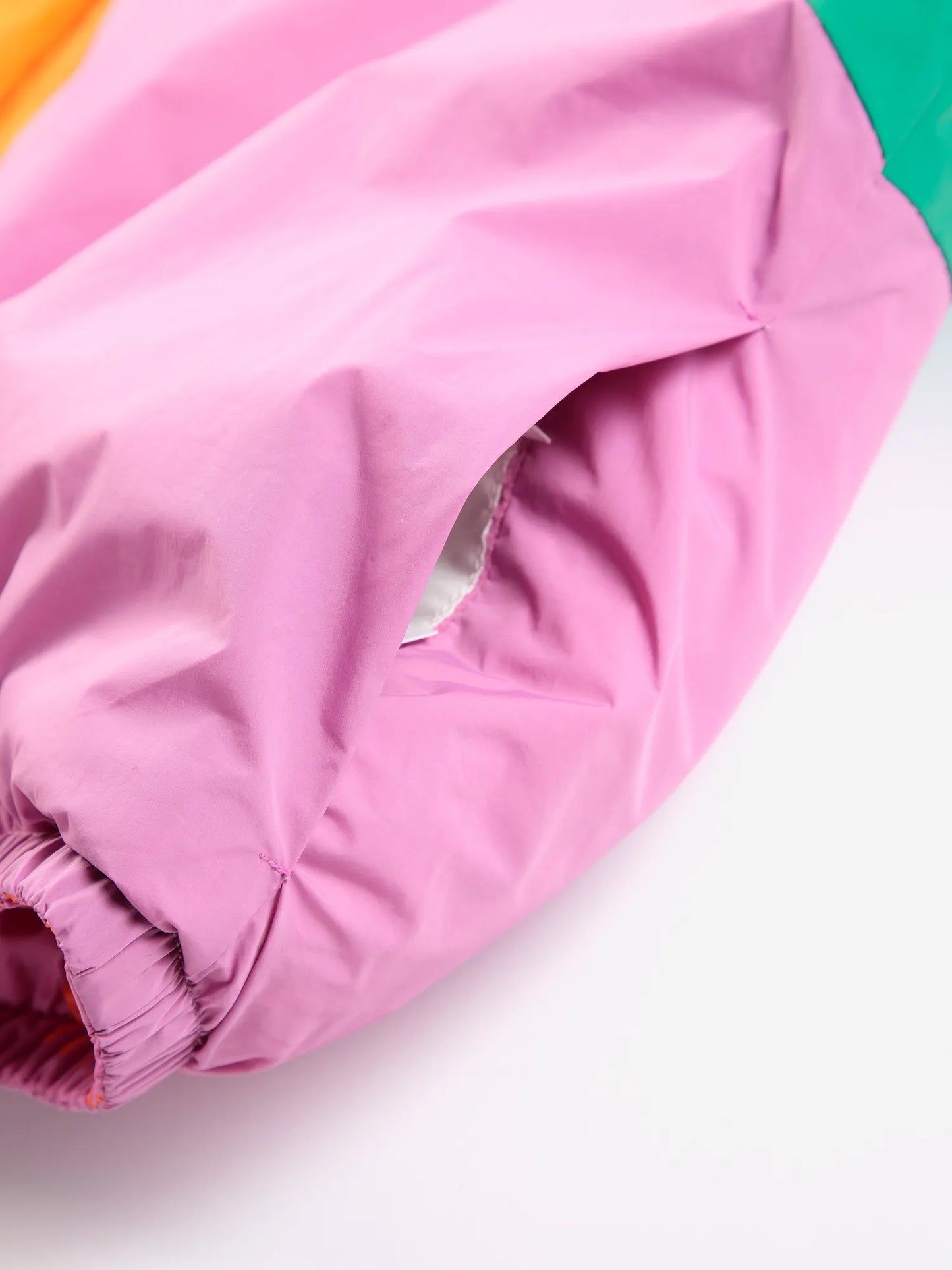 Almost Moiré all over reversible pink anorak