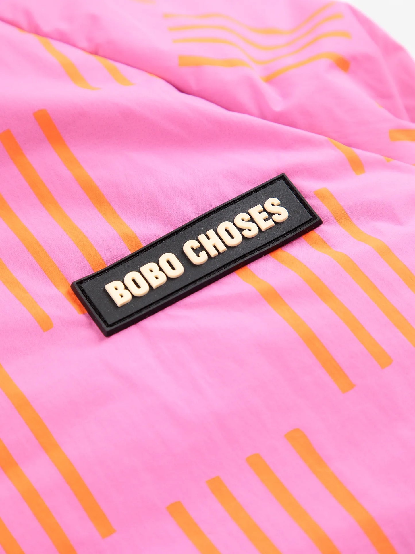 Almost Moiré all over reversible pink anorak