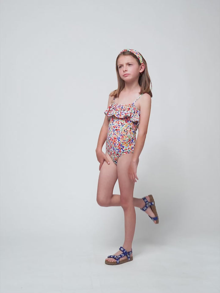 全体にコンフェッティがあしらわれたフリル付き水着