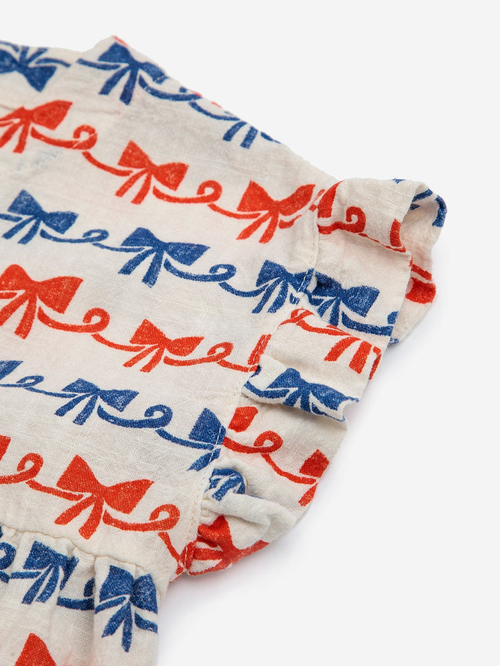 リボンボウが全体に施された織りドレス